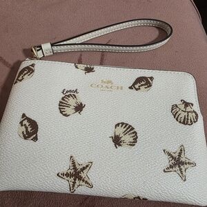 Coach Cream and Brown Seashell Wristlet